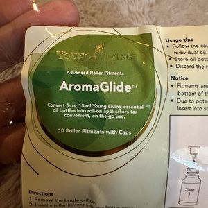 Unused AromaGlide roller fitments with cap.